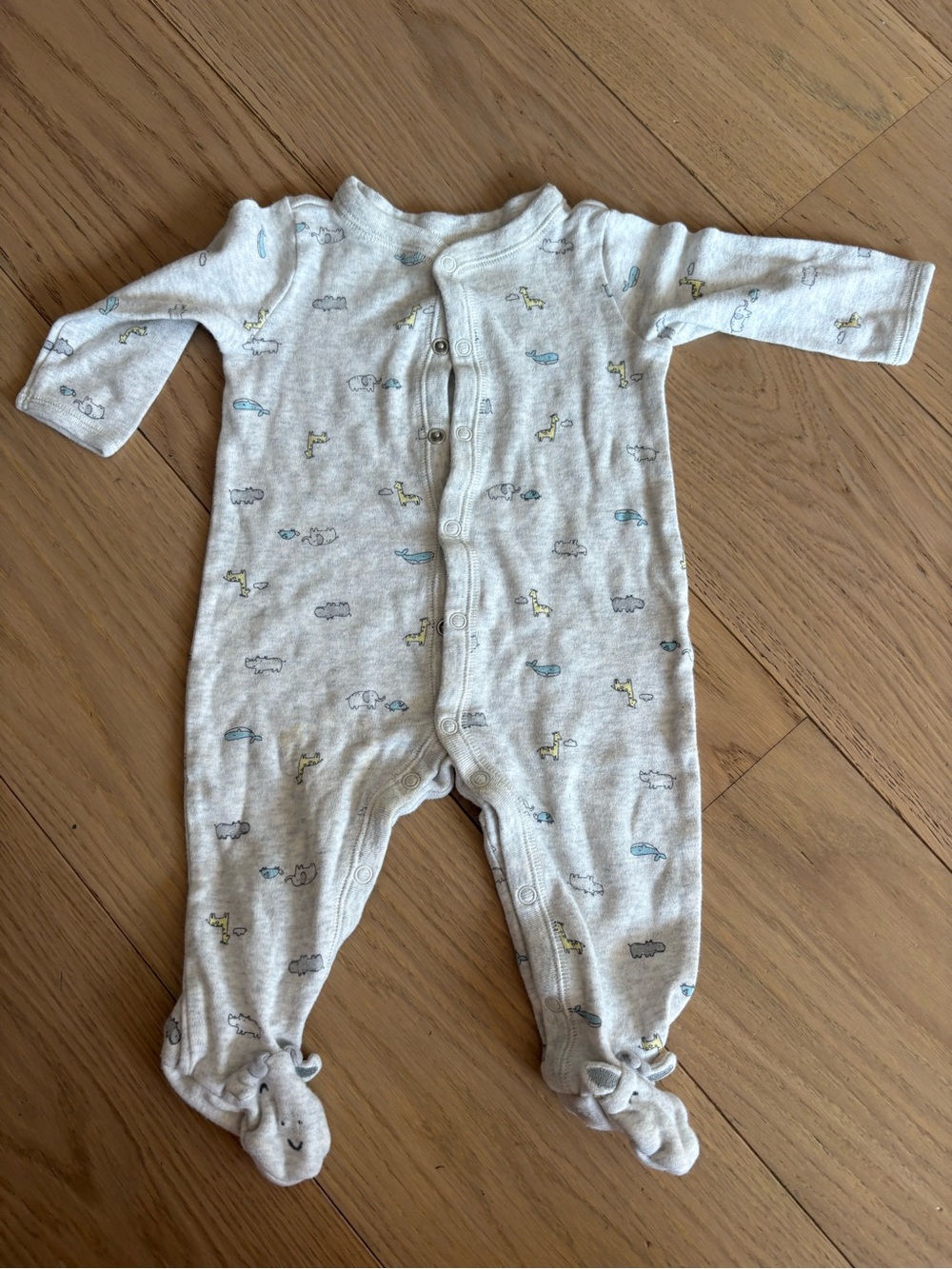 Carter’s animal printed footie - size 6 months